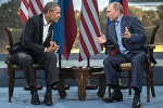 Le président russe Vladimir Poutine et le président américain Barack Obama